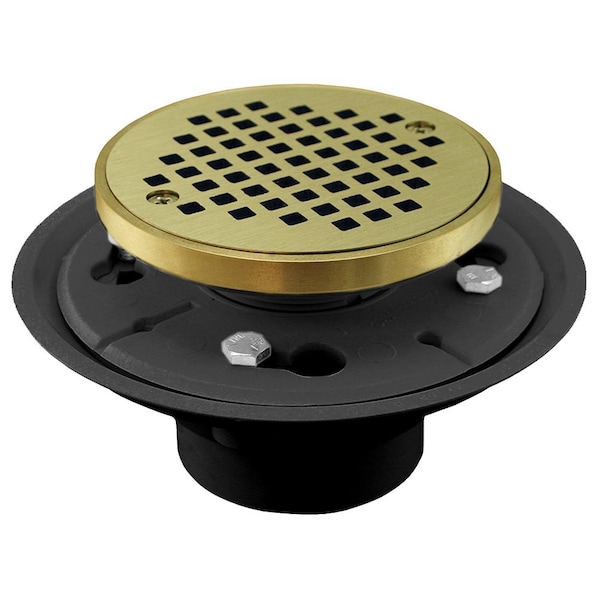Jones Stephens 2inX3in PVC Shower Drain, 2in Metal Spud, 4in Round Polished Brass Cast Strainer, Grout Ring D50133 - main